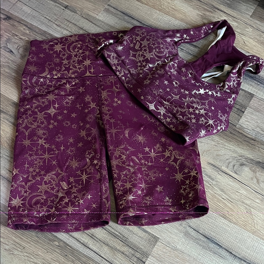 Fabletics burgundy and Gold Starry Activewear
